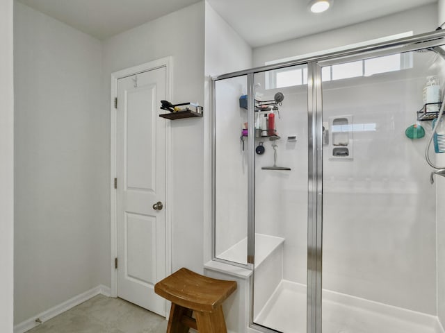 bathroom featuring a shower stall
