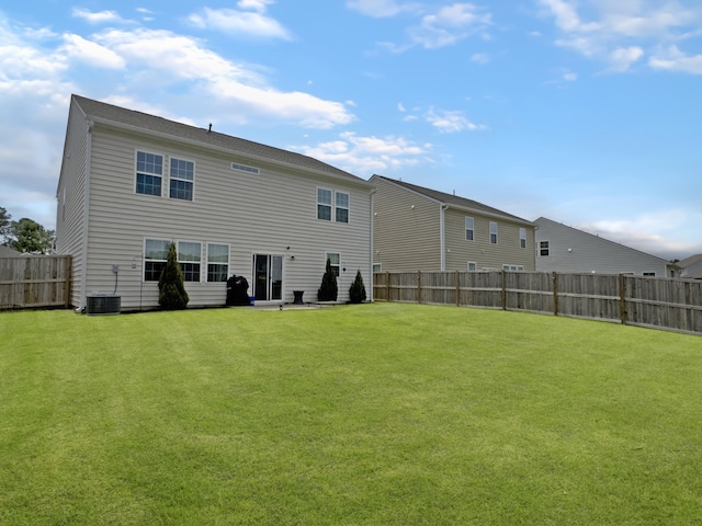 back of house featuring central air condition unit
