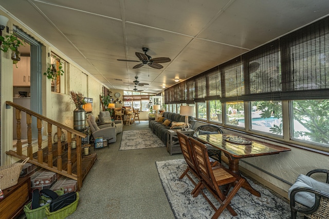 sunroom / solarium with ceiling fan