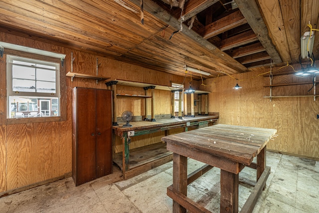 interior space featuring wood walls