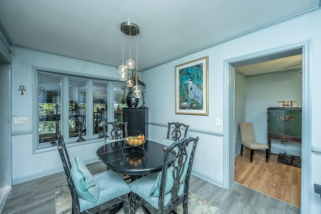 dining room with hardwood / wood-style flooring