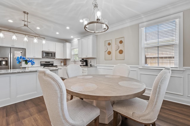 4319 Bream Rd, Charleston, SC 29418 - dining area with ornamental molding, a chandelier, dark wood-type flooring, a wainscoted wall, and recessed lighting