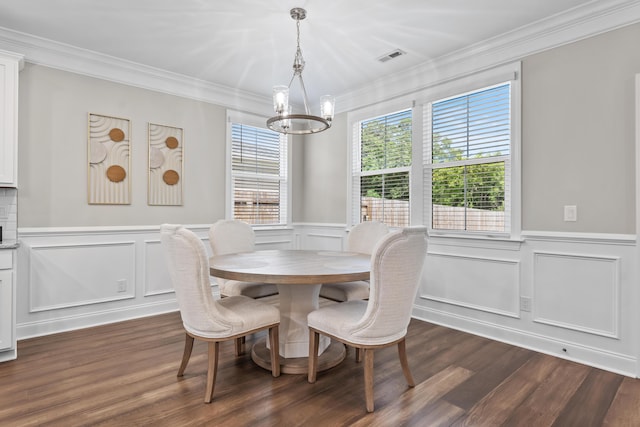 4319 Bream Rd, Charleston, SC 29418 - dining space featuring a decorative wall, crown molding, a chandelier, wainscoting, and dark wood-style flooring