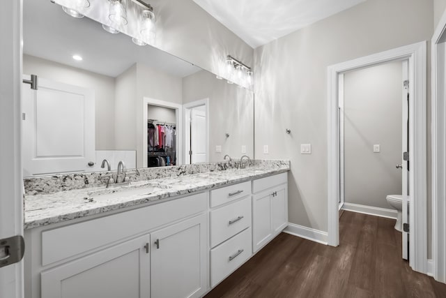 4319 Bream Rd, Charleston, SC 29418 - full bathroom featuring double vanity, wood finished floors, and a walk in closet
