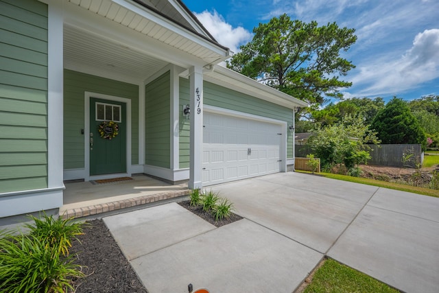 4319 Bream Rd, Charleston, SC 29418 - entrance to property featuring driveway, covered porch, and an attached garage