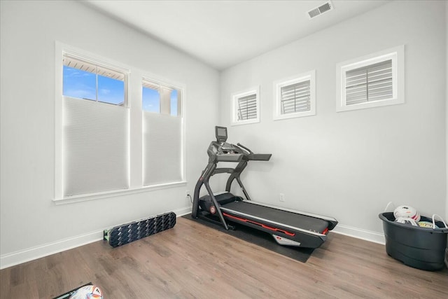 exercise area with hardwood / wood-style floors