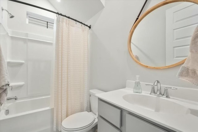 full bathroom with toilet, vanity, and shower / tub combo with curtain