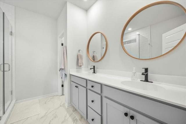 bathroom featuring walk in shower and vanity