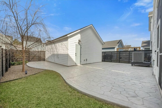 view of outbuilding featuring a yard