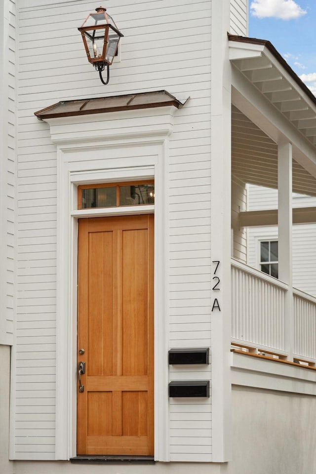 doorway to property with a balcony