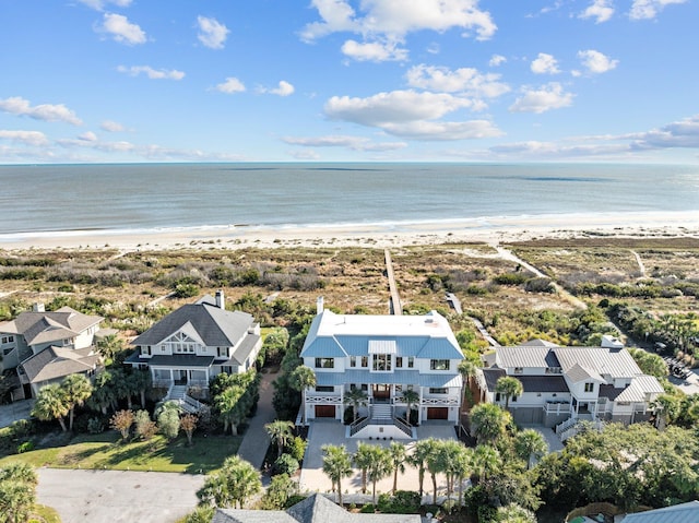 bird's eye view featuring a beach view and a water view