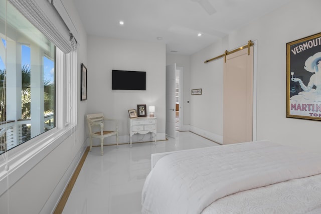 tiled bedroom with a barn door