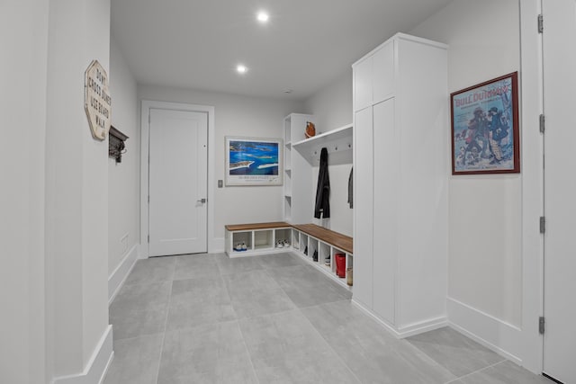 mudroom with light tile patterned floors