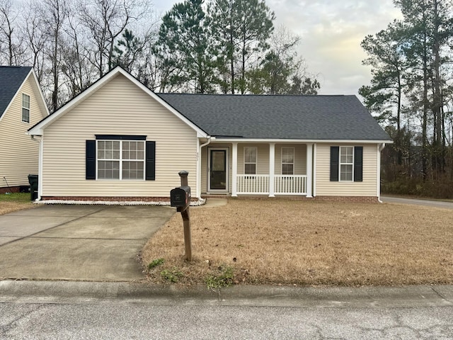 ranch-style home with covered porch