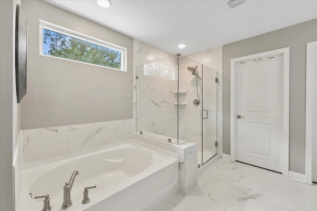 bathroom with visible vents, baseboards, marble finish floor, a shower stall, and a bath