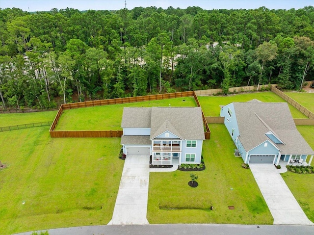 aerial view featuring a view of trees