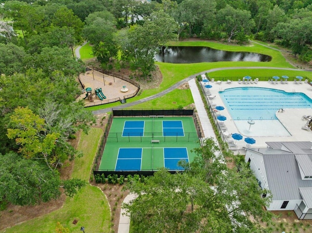 birds eye view of property with a water view