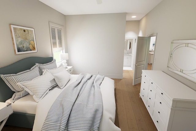 bedroom with baseboards, recessed lighting, ensuite bathroom, and light wood-style flooring