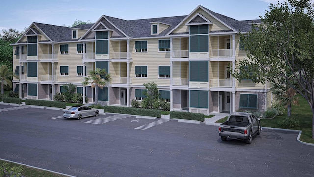 view of property with uncovered parking