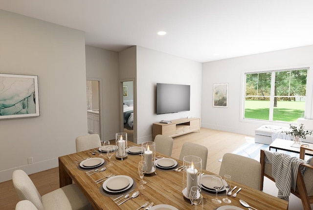 dining room with recessed lighting, light wood-type flooring, and baseboards