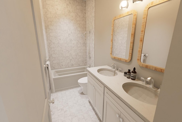 full bath featuring toilet, shower / bathtub combination, a sink, and double vanity
