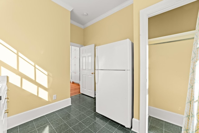 interior space with white refrigerator and crown molding