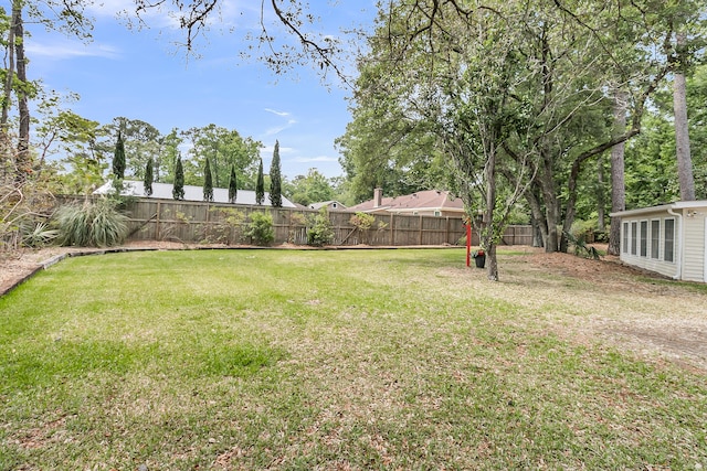 view of yard featuring fence