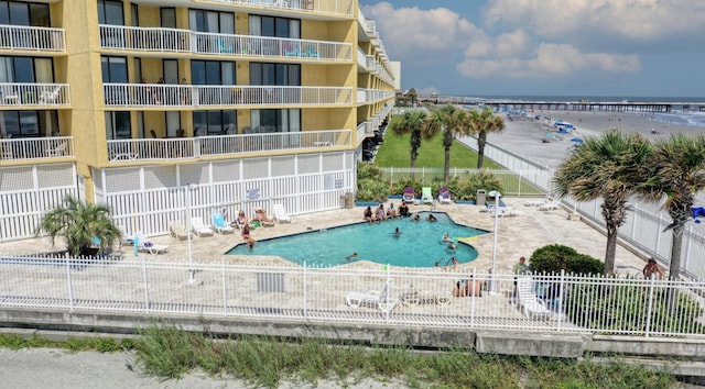 view of swimming pool featuring a patio