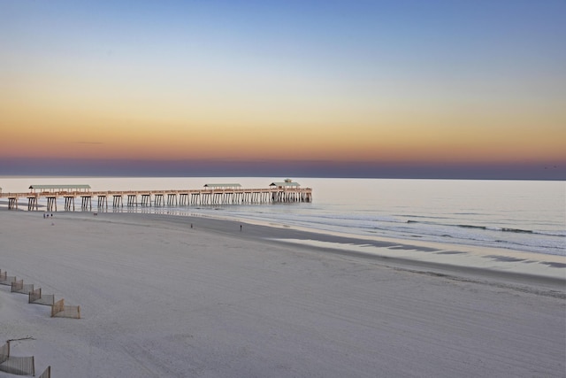 property view of water featuring a beach view