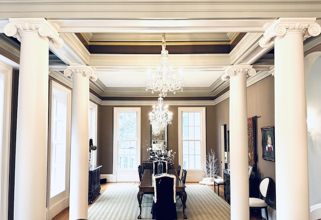 174 N Shelmore Blvd, Mount Pleasant, SC 29464 - dining area with ornamental molding, a chandelier, decorative columns, and wood finished floors