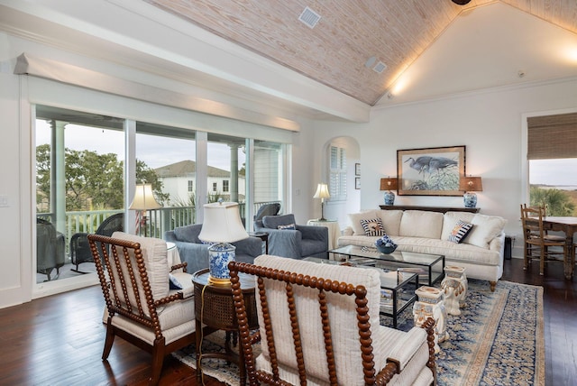 living room with crown molding, dark wood-type flooring, and vaulted ceiling