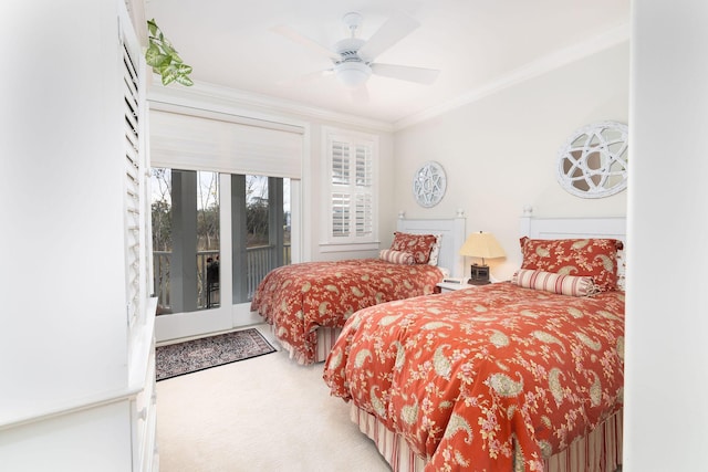 bedroom featuring access to exterior, ceiling fan, crown molding, and carpet floors