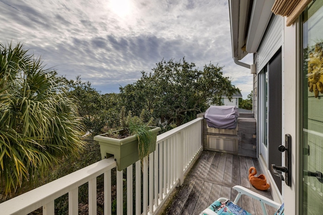 balcony featuring area for grilling