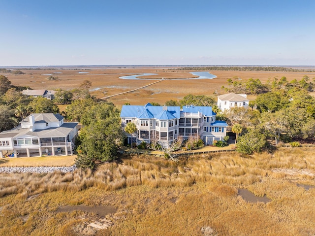 birds eye view of property with a rural view