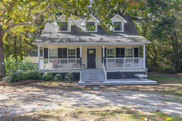 cape cod house with covered porch