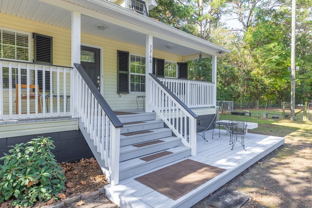 entrance to property with covered porch