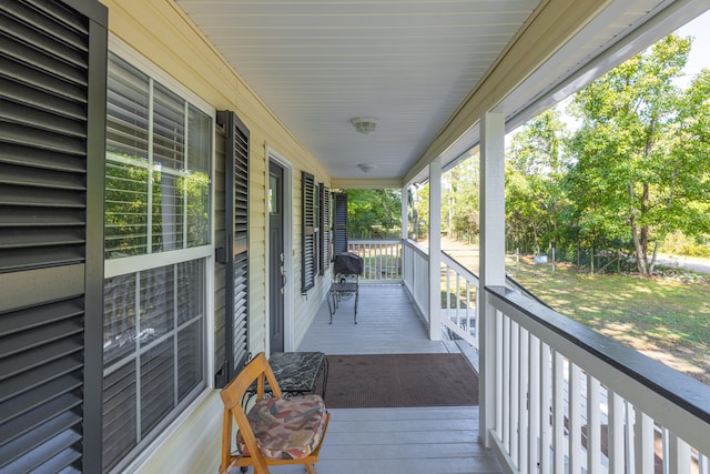 deck featuring covered porch