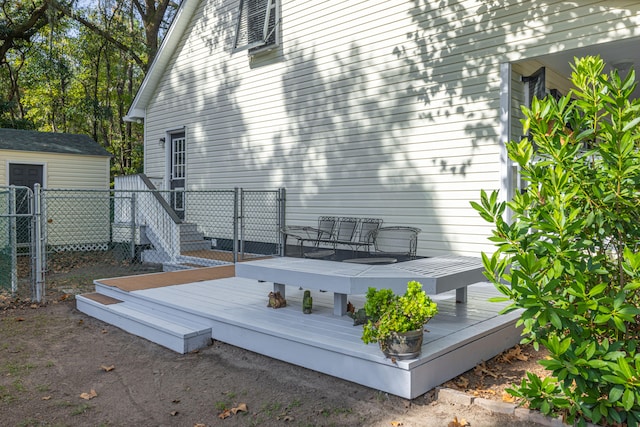 deck featuring a storage shed