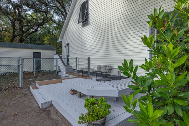 deck with an outbuilding