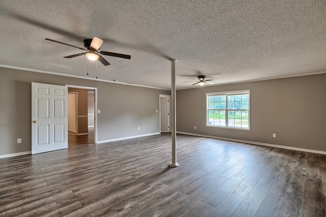 spare room featuring dark wood-style floors, crown molding, and a ceiling fan