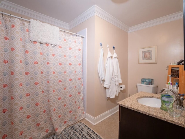 bathroom featuring tile patterned flooring, vanity, and crown molding