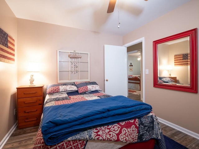 bedroom with hardwood / wood-style flooring and ceiling fan