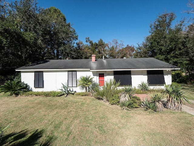 ranch-style house with a front yard