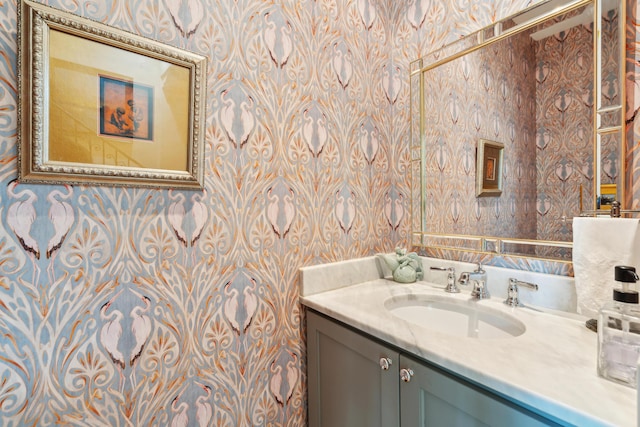 1612 John Fenwick Ln, Johns Island, SC 29455 - bathroom featuring wallpapered walls and vanity