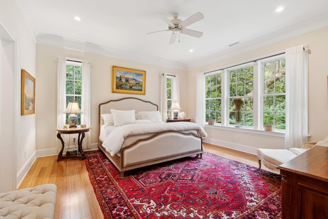 1612 John Fenwick Ln, Johns Island, SC 29455 - bedroom with light wood-style floors, crown molding, recessed lighting, and a ceiling fan