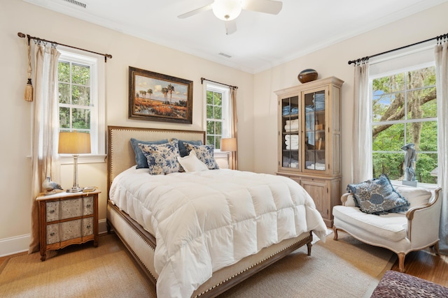 1612 John Fenwick Ln, Johns Island, SC 29455 - bedroom with light wood-style floors and ceiling fan