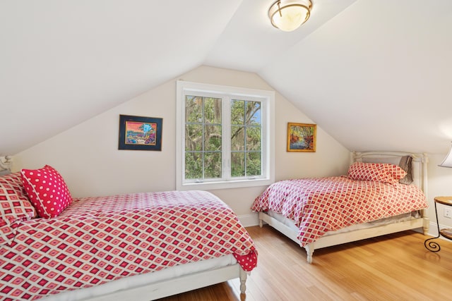 1612 John Fenwick Ln, Johns Island, SC 29455 - bedroom featuring wood finished floors and lofted ceiling