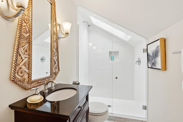 1612 John Fenwick Ln, Johns Island, SC 29455 - bathroom featuring a skylight, vaulted ceiling, vanity, and a shower stall