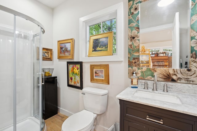 1612 John Fenwick Ln, Johns Island, SC 29455 - full bath with vanity, a stall shower, plenty of natural light, and wood finished floors
