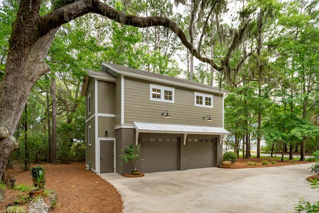 1612 John Fenwick Ln, Johns Island, SC 29455 - view of front of property featuring concrete driveway and an attached garage